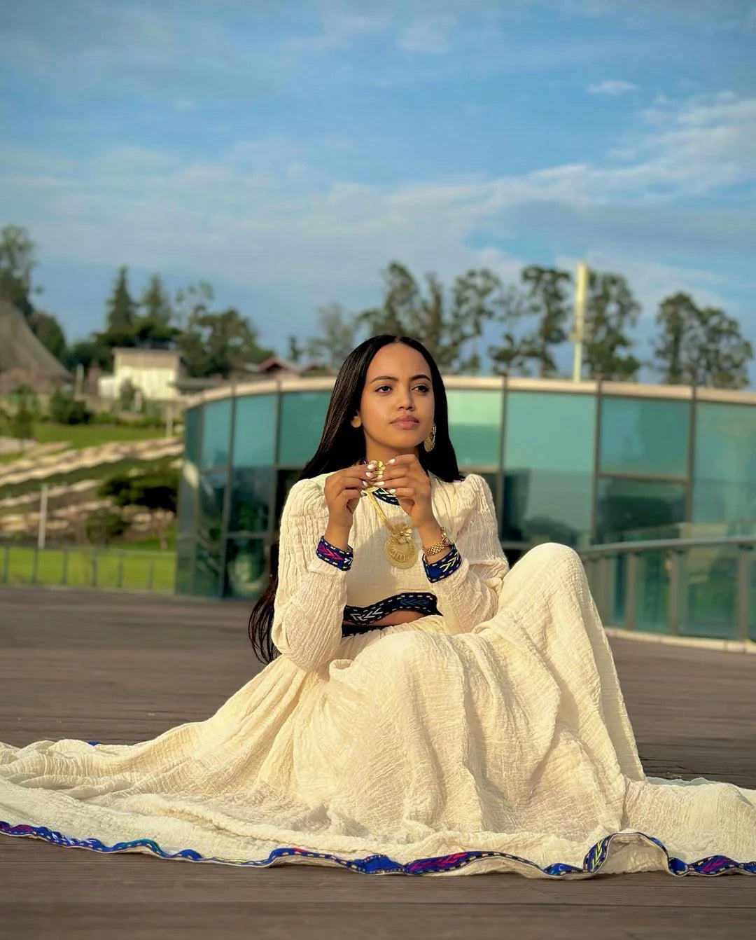 A chic Habesha two-piece stylish crop top and flowing skirt