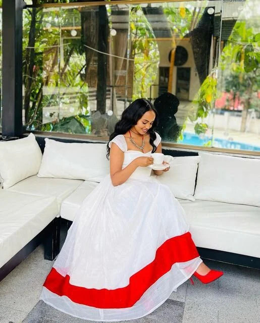A Stunning Shimena Habesha Kemis with Vibrant Red Design