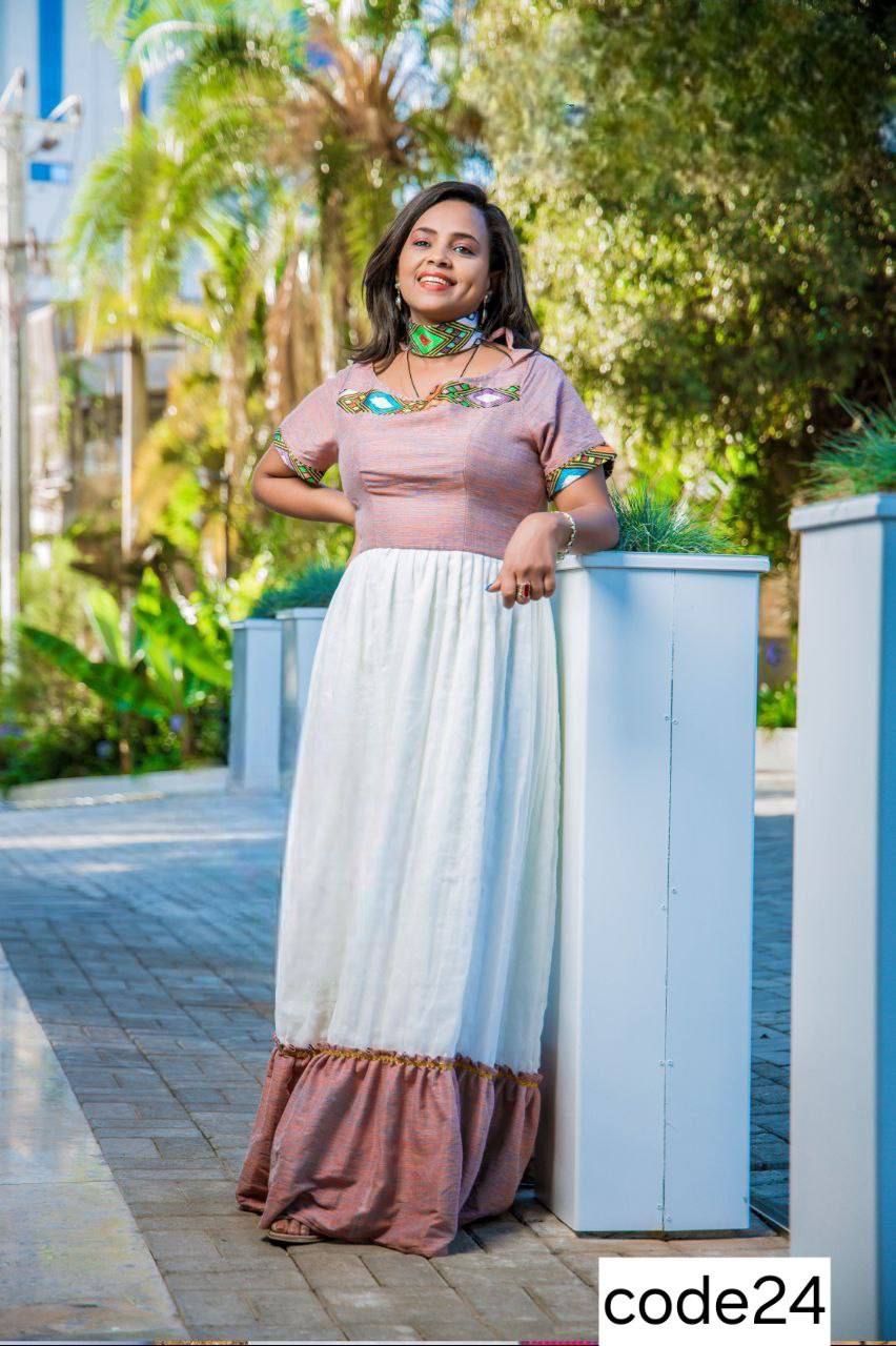 A Beautifully Crafted Elegant Fusion Dress: Blending Traditional Embroidery with Modern Silhouette for Timeless Style