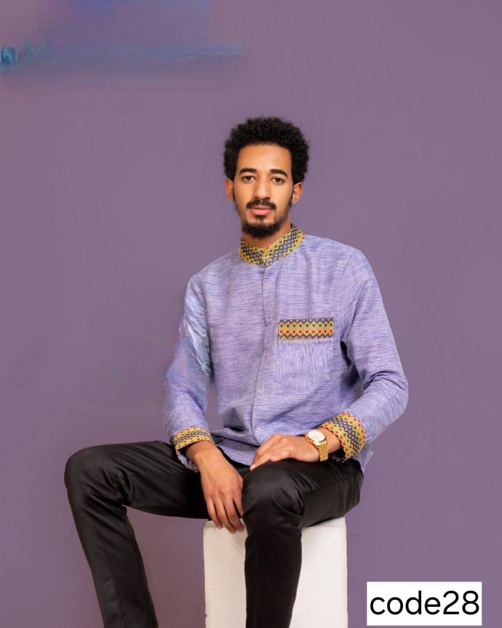 Sophisticated Light Blue Shirt with Intricate Cultural Accents and Modern Fit