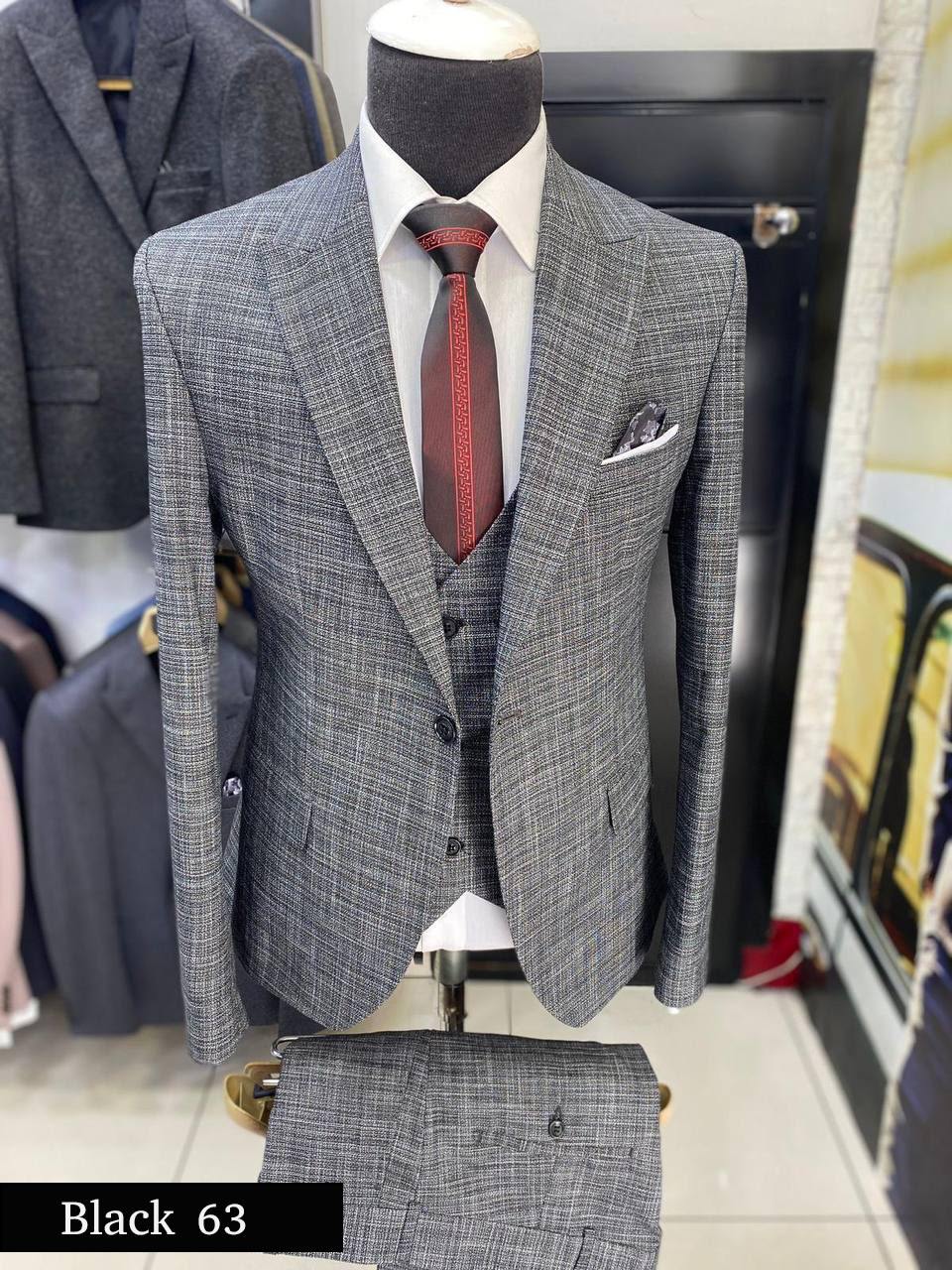 Sophisticated Black Three-Piece Suit Timeless Elegance with a Modern Twist