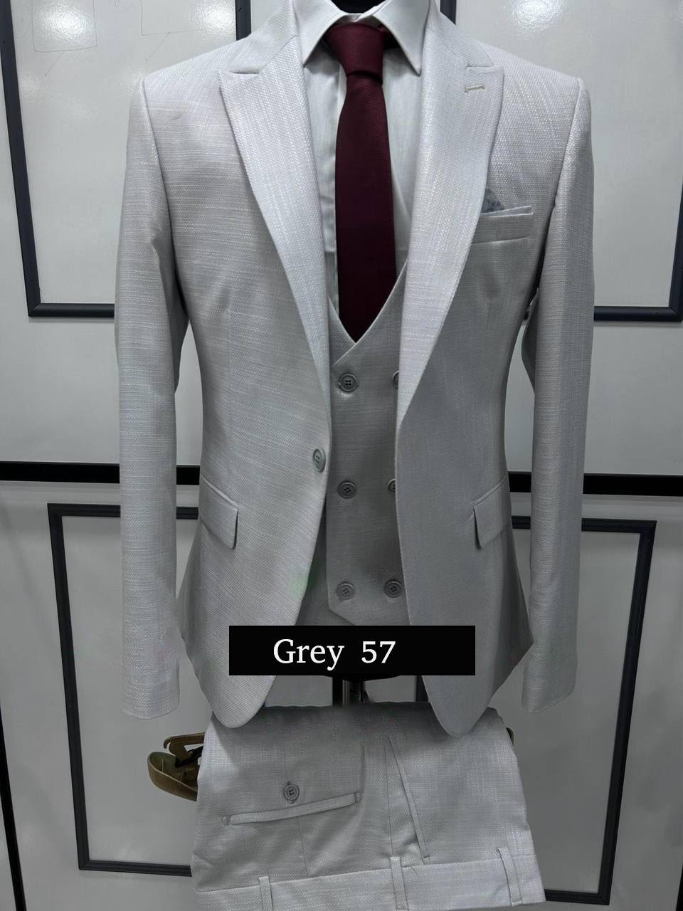 Modern Grey Three-Piece Suit Sophisticated Style with a Twist