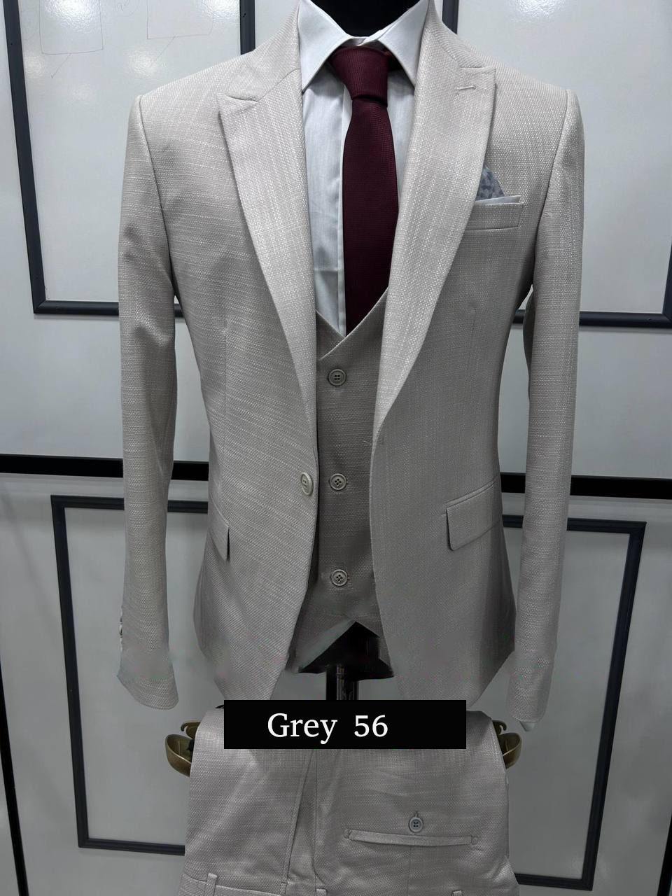 Modern Grey Three-Piece Suit Sophisticated Style with a Twist