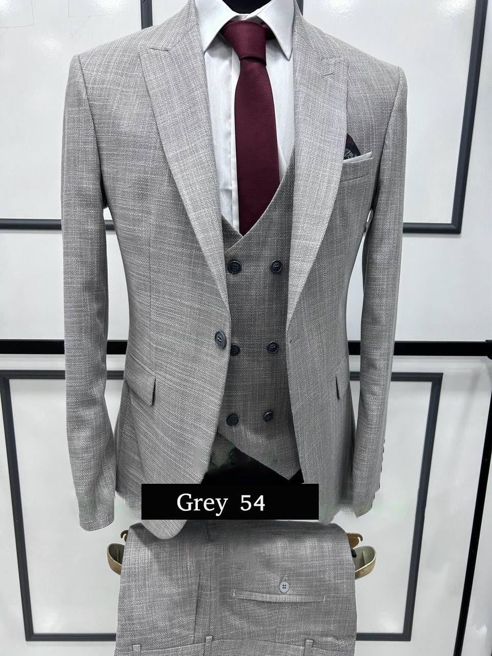 Modern Grey Three-Piece Suit Sophisticated Style with a Twist
