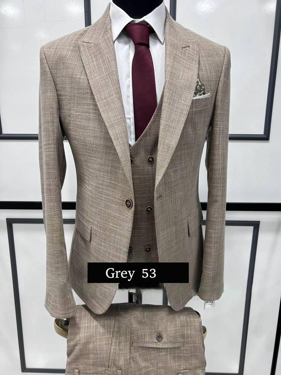 Modern Grey Three-Piece Suit Sophisticated Style with a Twist
