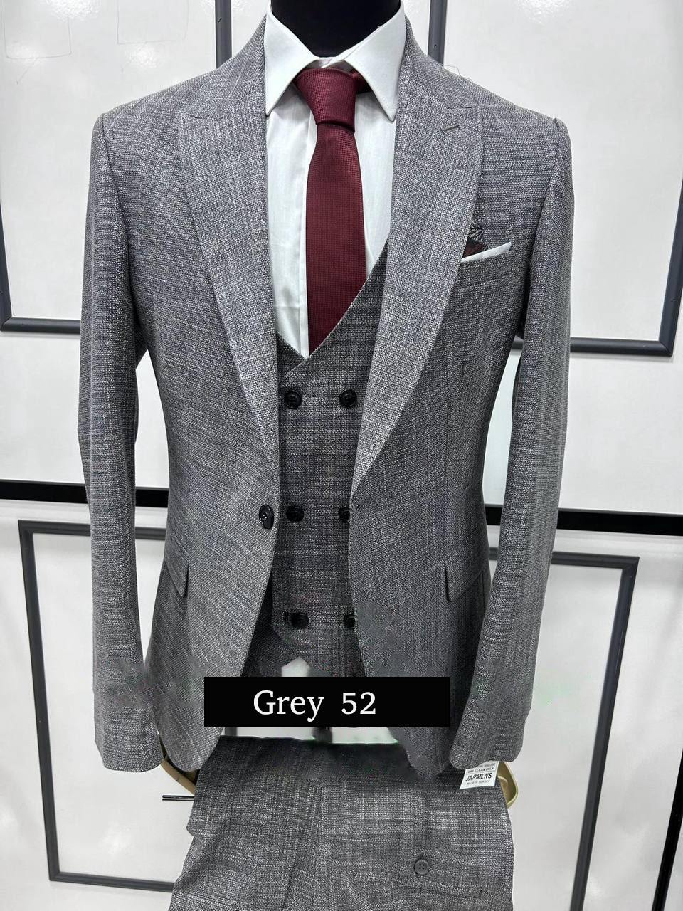 Modern Grey Three-Piece Suit Sophisticated Style with a Twist