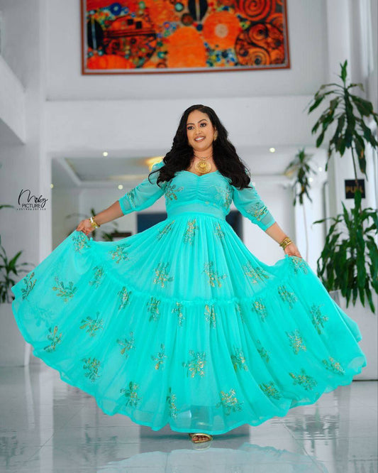 Elegance in Turquoise A Celebration of Habesha Chiffon Fashion