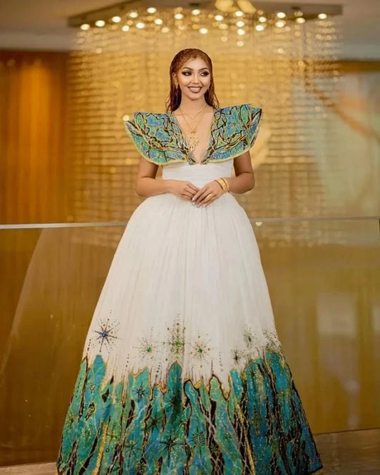 Beautiful Habesha Dress with Intricate Blue and Gold Embroidery
