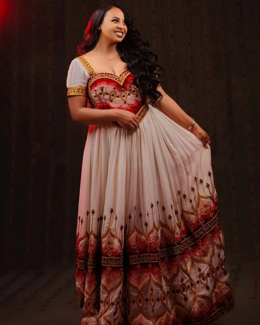 Stunning Habesha Dress with Vibrant Colors and Intricate Embroidery