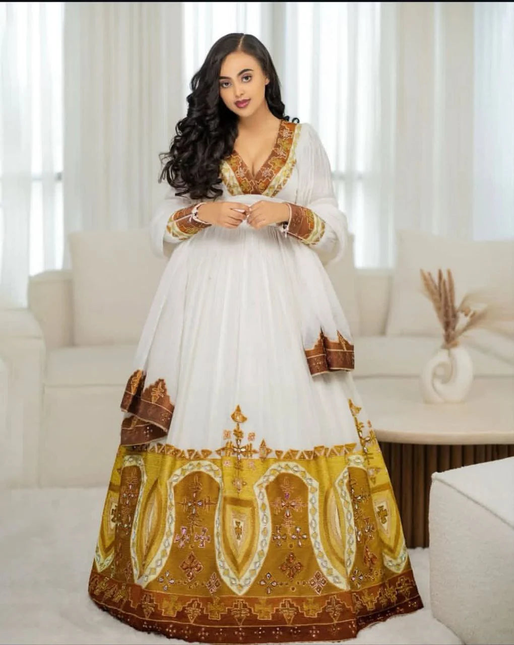 Exquisite Habesha Dress with Vibrant Colors and Intricate Embroidery