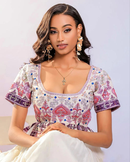Exquisite Habesha Dress with Vibrant Embroidery