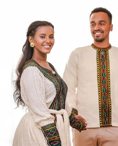 Embracing Tradition in Dark Tilet Habesha Couples Outfit.