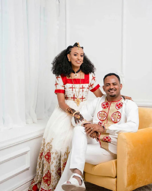 Radiant Red Habesha Couples Outfit: Vibrant Habesha Attire.