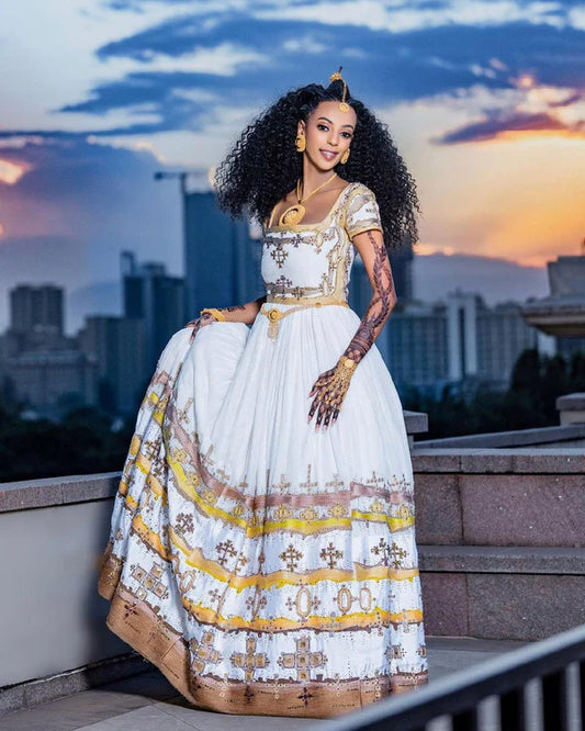 Sparkling Brown and Yellow: Habesha Couples Outfit for Weddings