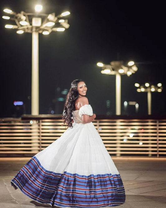 Modern Gorgeous Oromo Couples Outfit: Habesha Wedding Attire