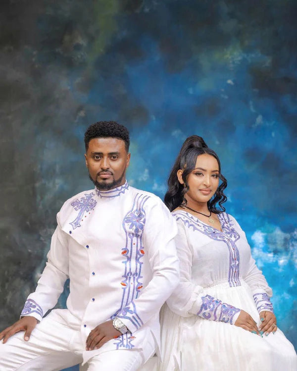 Blue Design: Habesha Couples' Outfits in Ethereal Light Hues