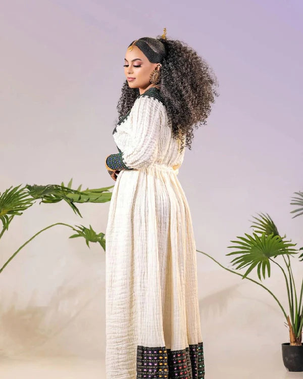 Cultural Habesha Couple's Outfit: Simple Yet Elegant.