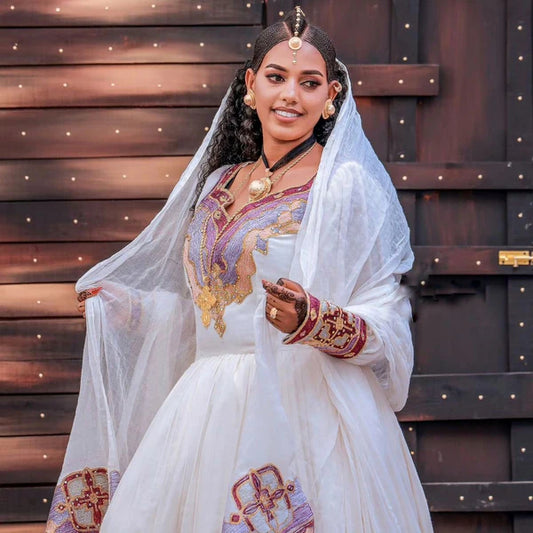 Gorgeous Habesha Wedding Dress: Beaded Couples Outfit