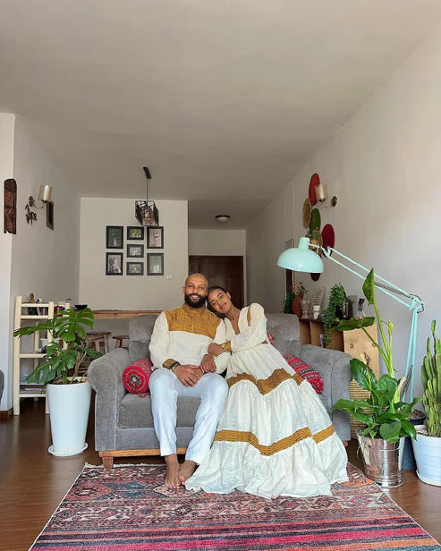 Vibrant Yellow Matching Habesha Couples Outfit Perfect for Celebrating Culture and Love