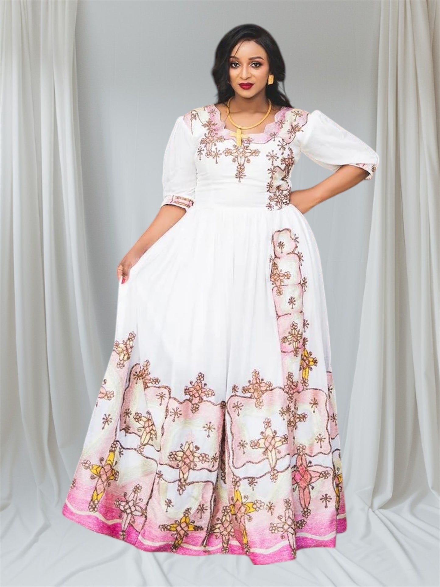 charming Habesha wedding dress exudes elegance with its delicate pink hue and exquisite detailing
