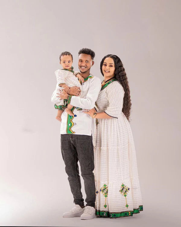 Oromo Couple's Outfit with Accessories: Traditional and Elegant.