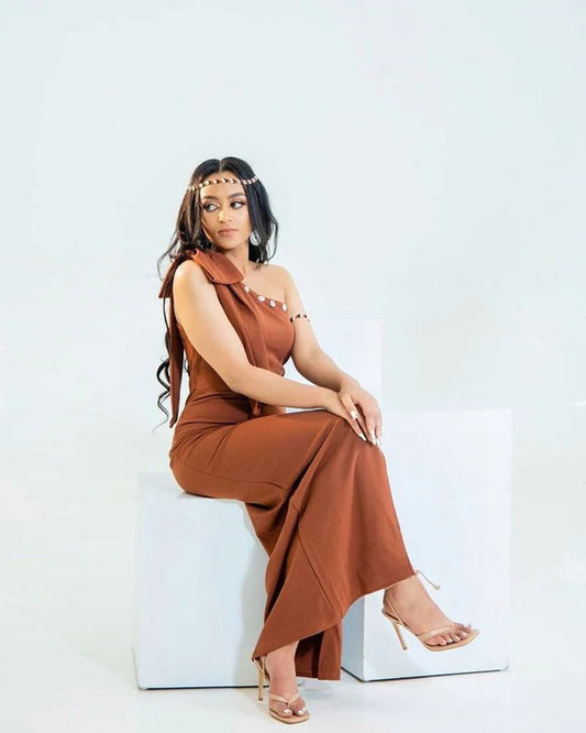 Cultural Oromo Couples' Outfit with Accessories in Brown.