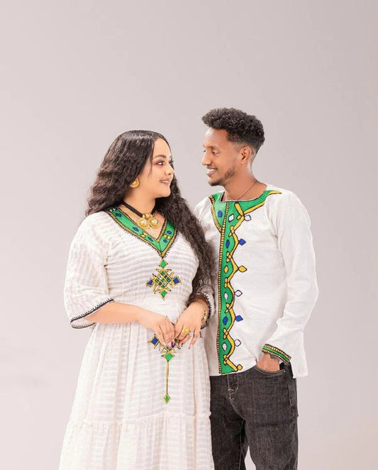 Oromo Couple's Outfit with Accessories: Traditional and Elegant.