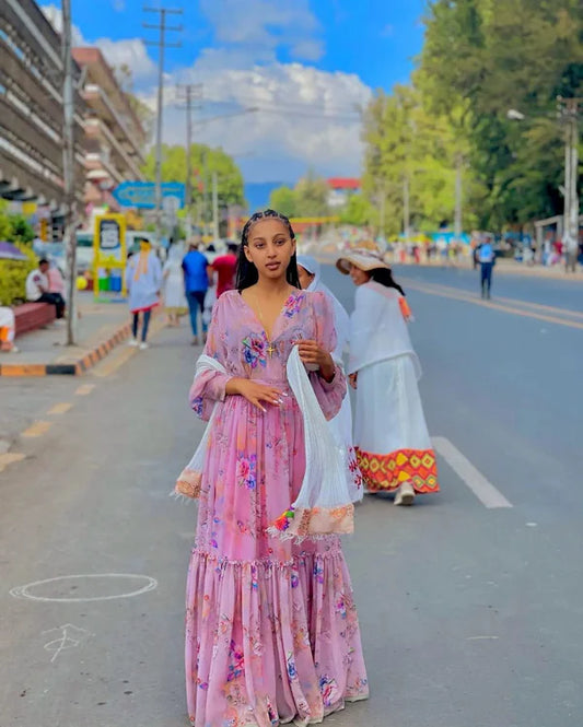 Stunning Sweet Pink Habesha Chiffon Dress with Colorful Patterns