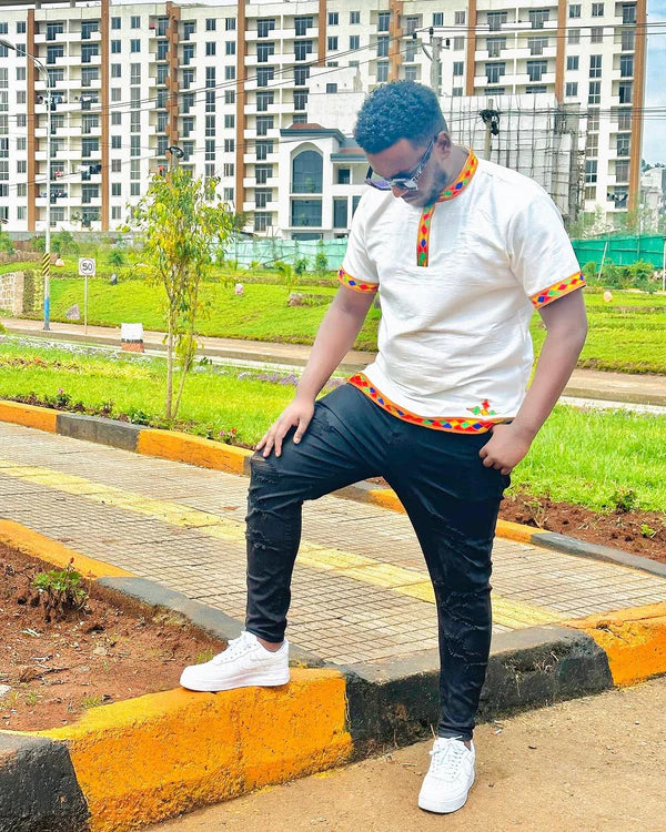 Lively Legacy: Handcrafted Multicolored Pattern Habesha Men's Shirt - A Spectrum of Ethiopian Elegance.