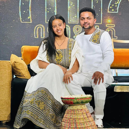 Exquisite Unity: Detailed Habesha Couples' Outfit.