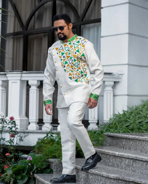 Enchanting Habesha Wedding Attire: Couples' Resplendent Green-Patterned Elegance.
