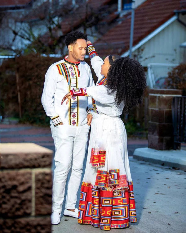 Crimson Splendor: Exquisite Patterned Habesha Couples' Attire.