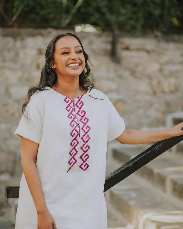 Regal Simplicity: Habesha Couples Outfit in Purple Fetil.