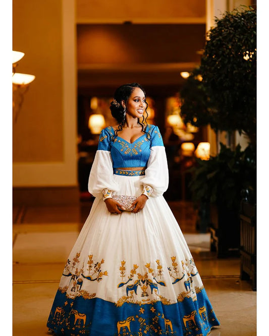 Ethereal Elegance: Habesha Couples Outfit in Blue Design.