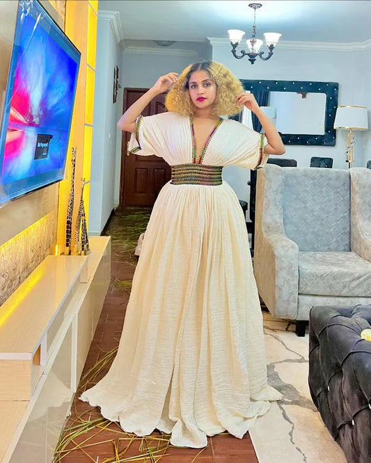 Timeless Elegance: Habesha Couples' Outfits in Modern Patterns