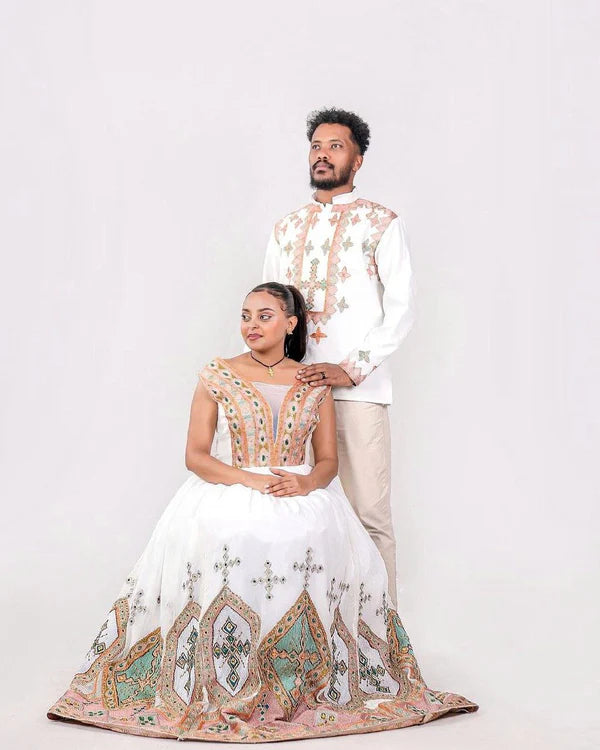 Light Color Habesha Couples Wedding Outfit: Modern Attire.