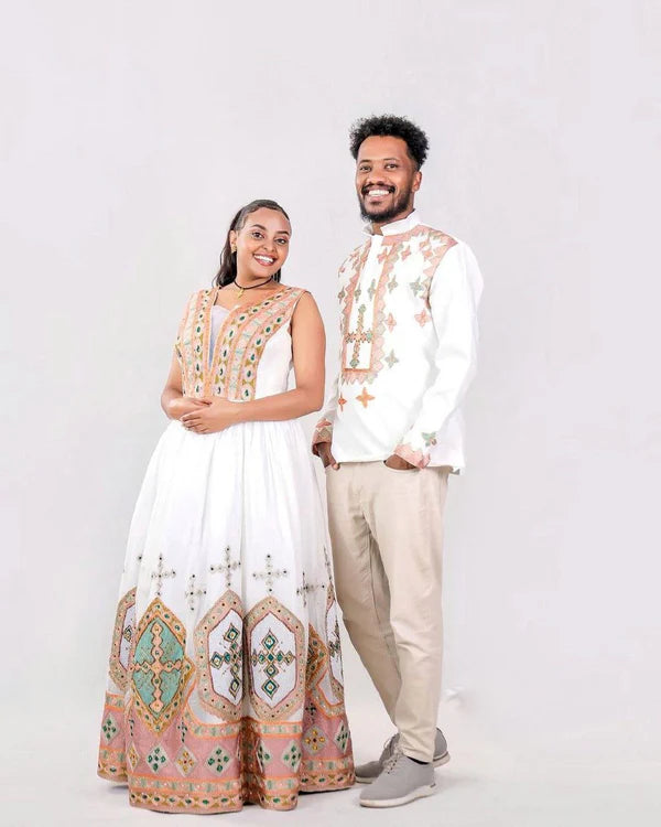 Light Color Habesha Couples Wedding Outfit: Modern Attire.
