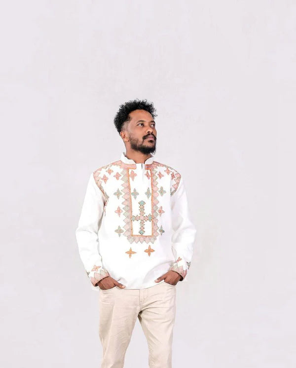 Light Color Habesha Couples Wedding Outfit: Modern Attire.
