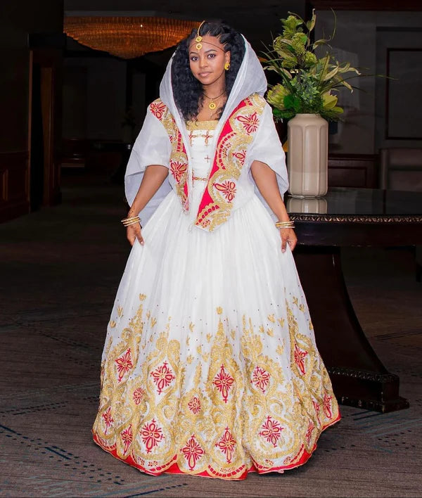 Gorgeous Habesha Couples Outfit: Vibrant Traditional Wedding Attire.
