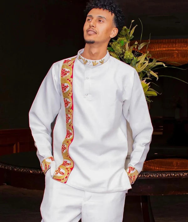 Gorgeous Habesha Couples Outfit: Vibrant Traditional Wedding Attire.