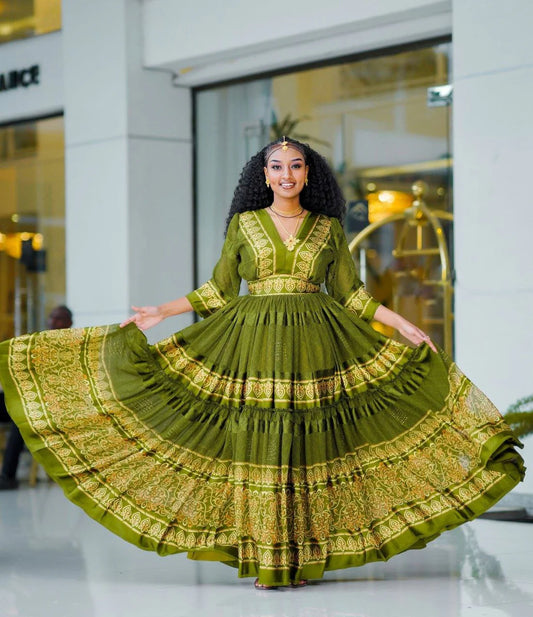 Breathtaking light green Habesha chiffon dress