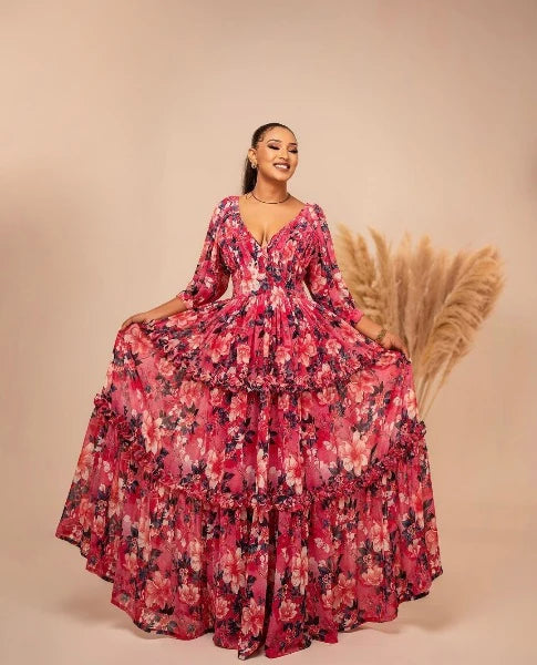 Floral Pink Habesha Chiffon Dress: Simple and Fresh Look for Cultural Celebrations.