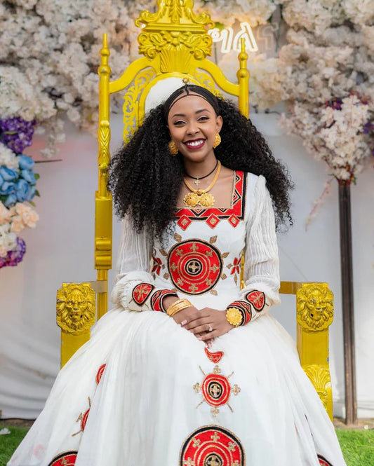 Beautiful Red Habesha Wedding Dress: Adorned with wide, dazzling embellishments