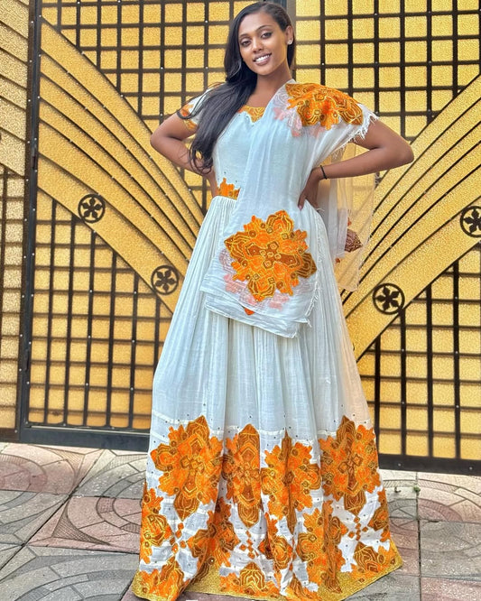 Adorned with diamond-shaped embroidery, is perfect for church and holidays