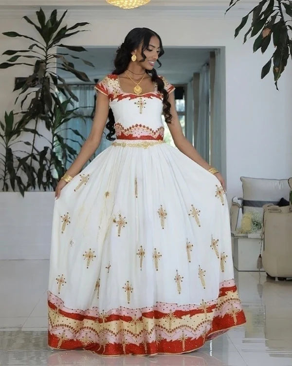 Celebrating Love in Red Habesha Couples Outfit: Regal Matching Habesha Couples Attire