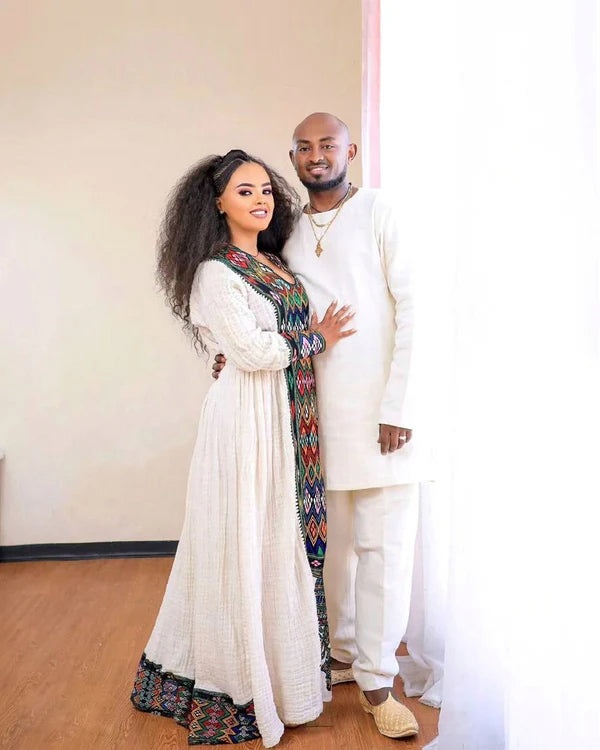 Darker Design in Traditional Habesha Couples Outfit Elegant Attire