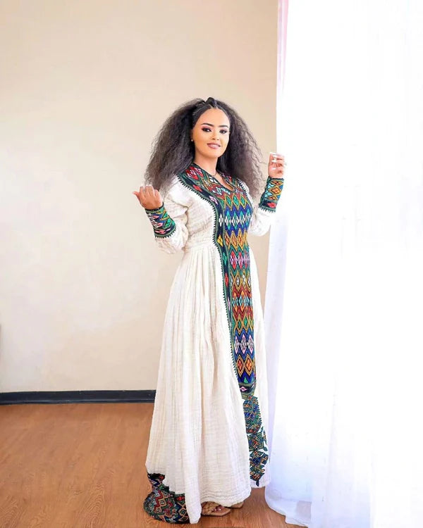 Darker Design in Traditional Habesha Couples Outfit Elegant Attire