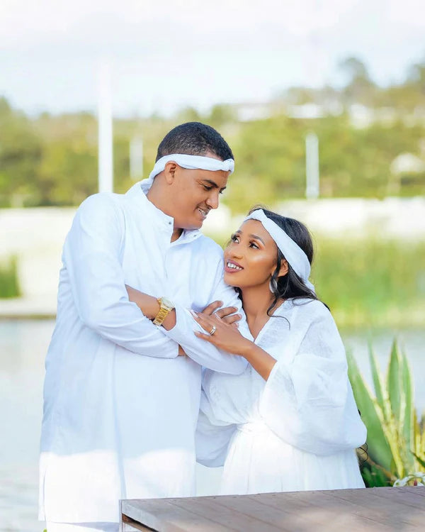 Stylish Habesha Couples Outfit: Elegant Red Design in Traditional Attire