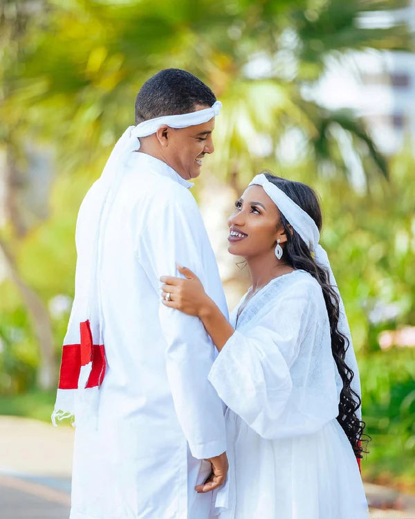 Stylish Habesha Couples Outfit: Elegant Red Design in Traditional Attire