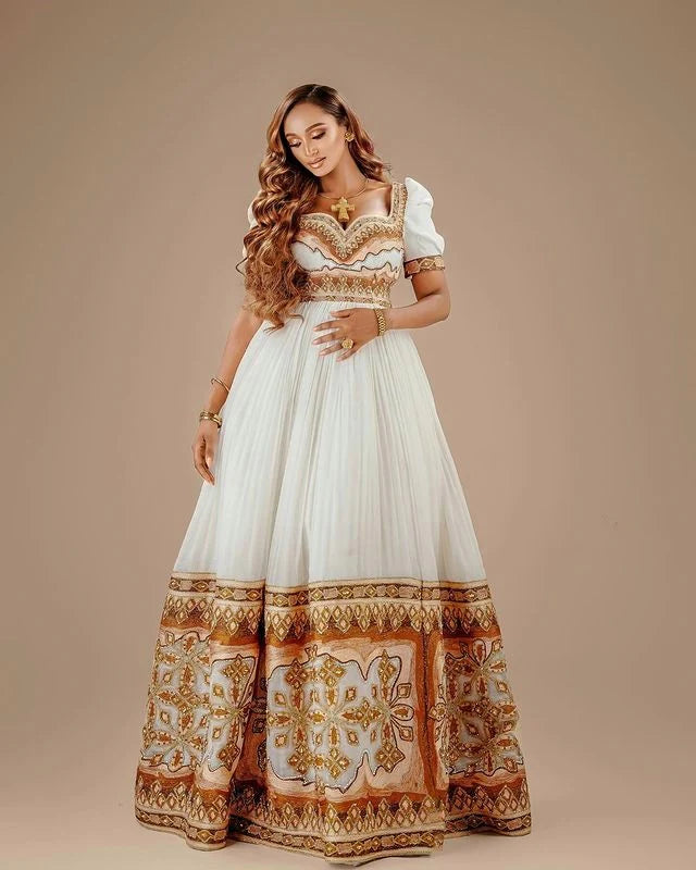 Elegant Habesha wedding dress exudes sophistication and charm with its captivating blend of brown and sparkly hues